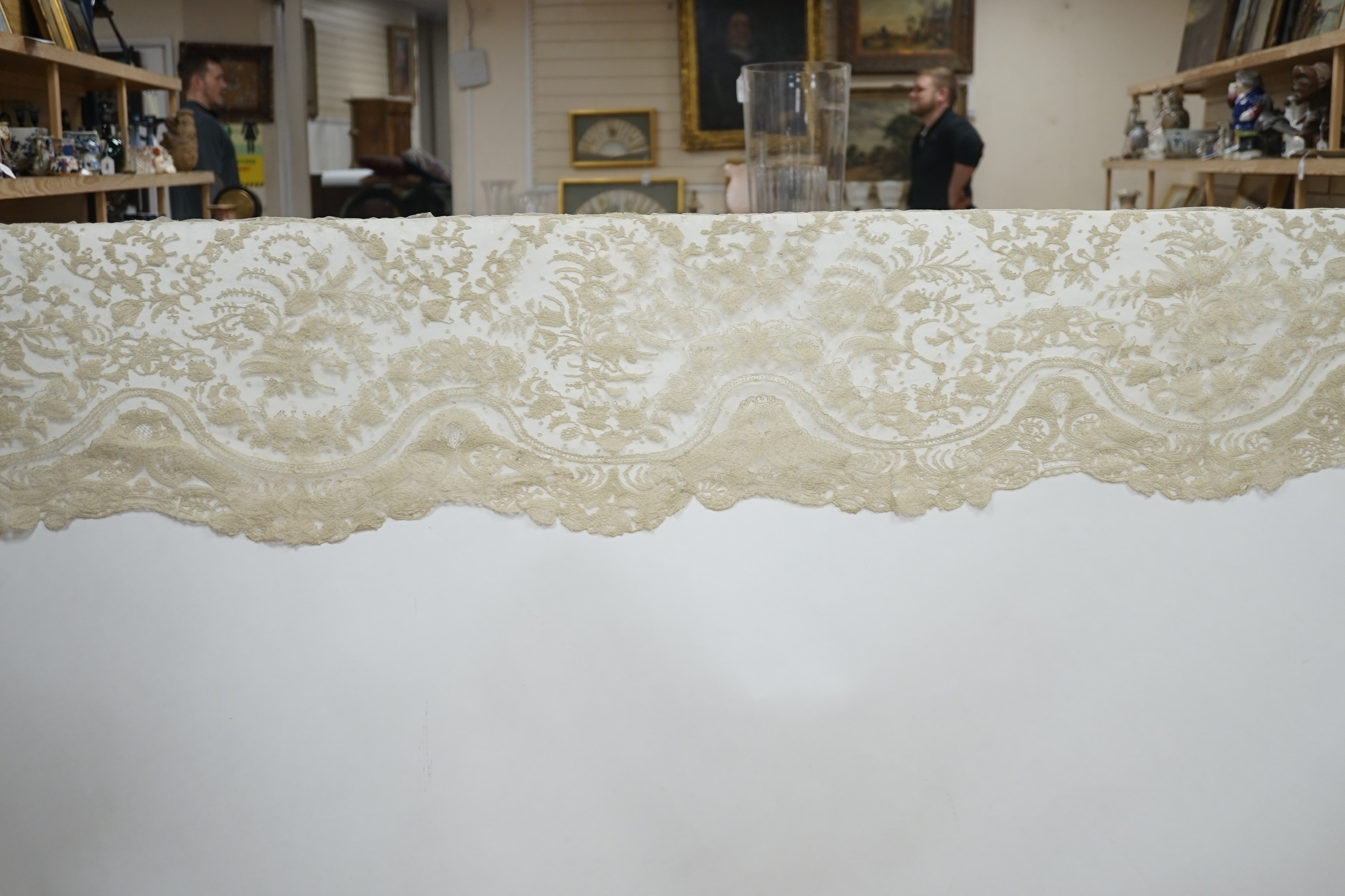 A rare length (9 and a half yards) of Brussels 19th century needle lace, some repairs and damage, circa 1880 and a similar wedding veil